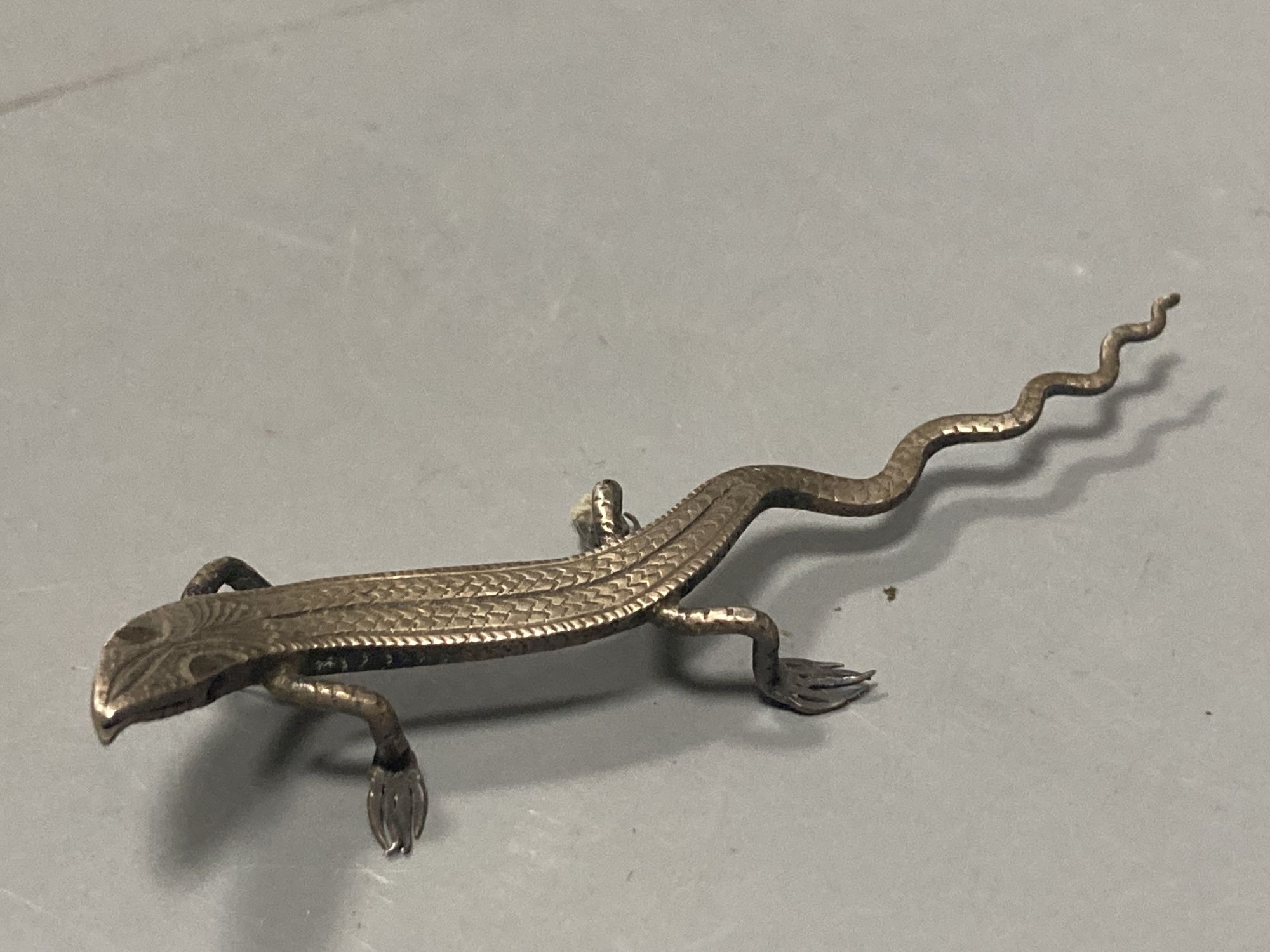 Five Indian? white metal miniature models of insects etc. including lizards, centipede and a scorpion, largest 87mm.